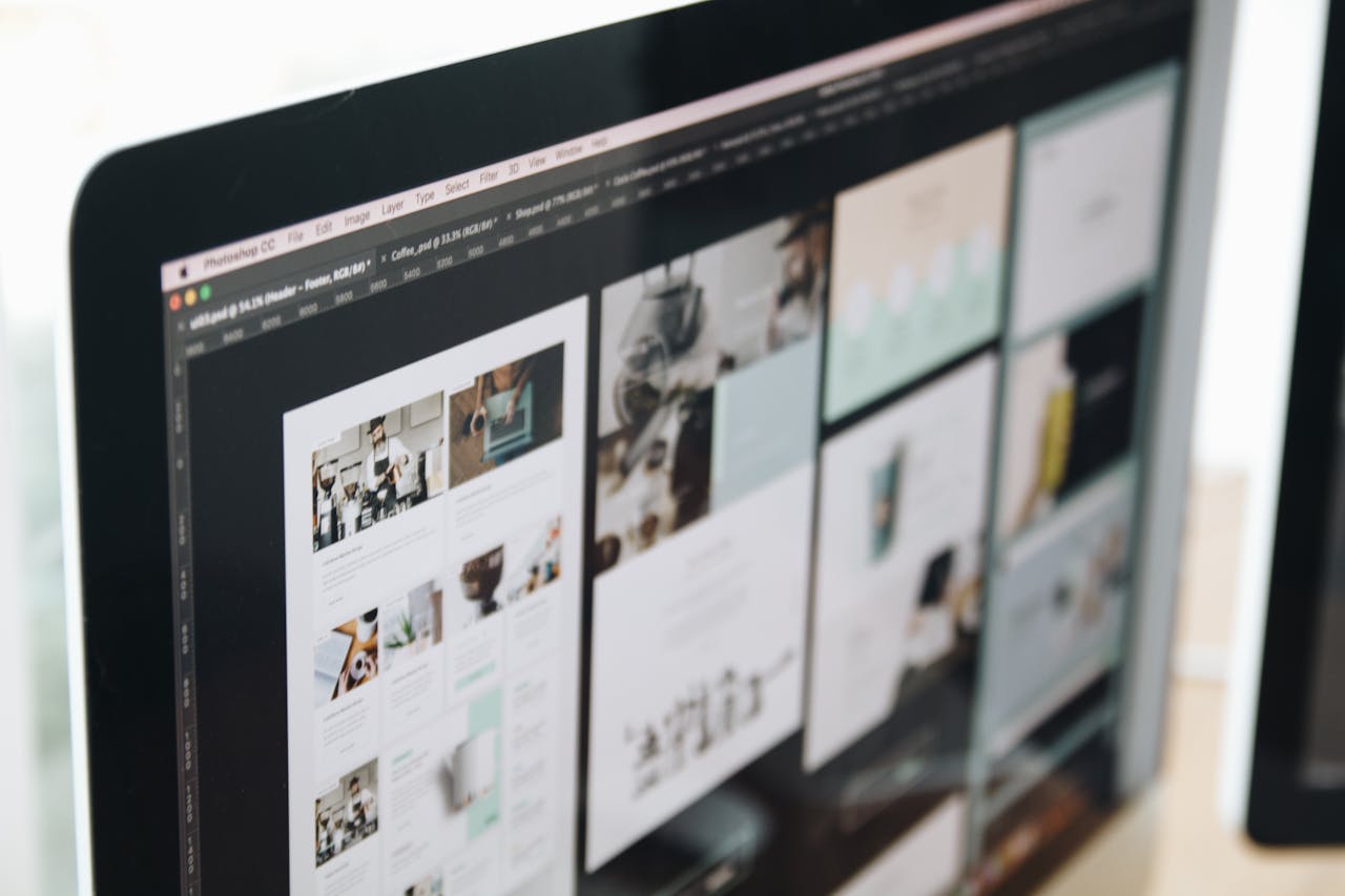 Computer screen displaying web design work